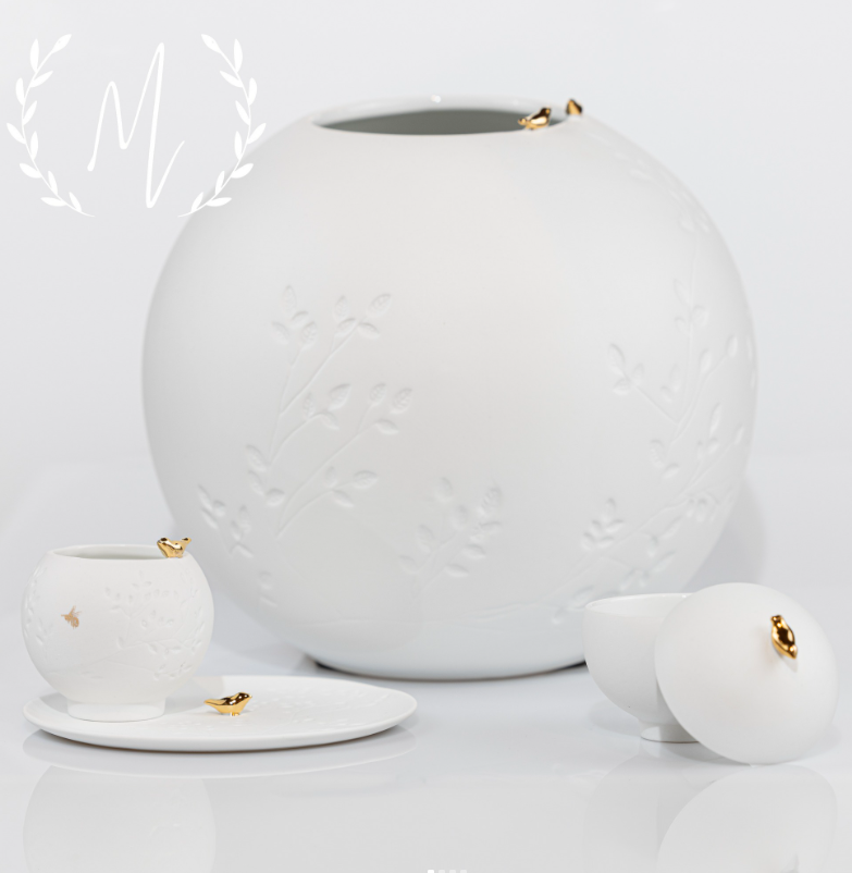 Porcelain jewelry box with gold bird detail