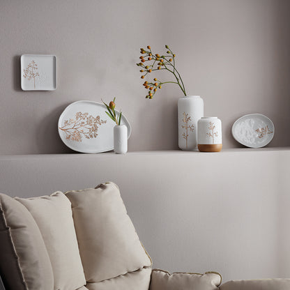Porcelain plate with a golden branch