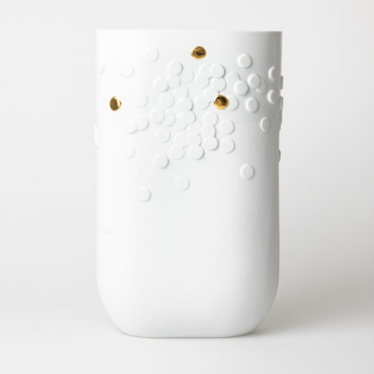 Vaso de bolinhas douradas