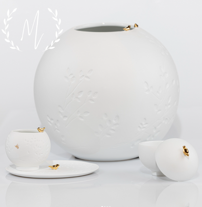 Porcelain jewelry box with gold bird detail